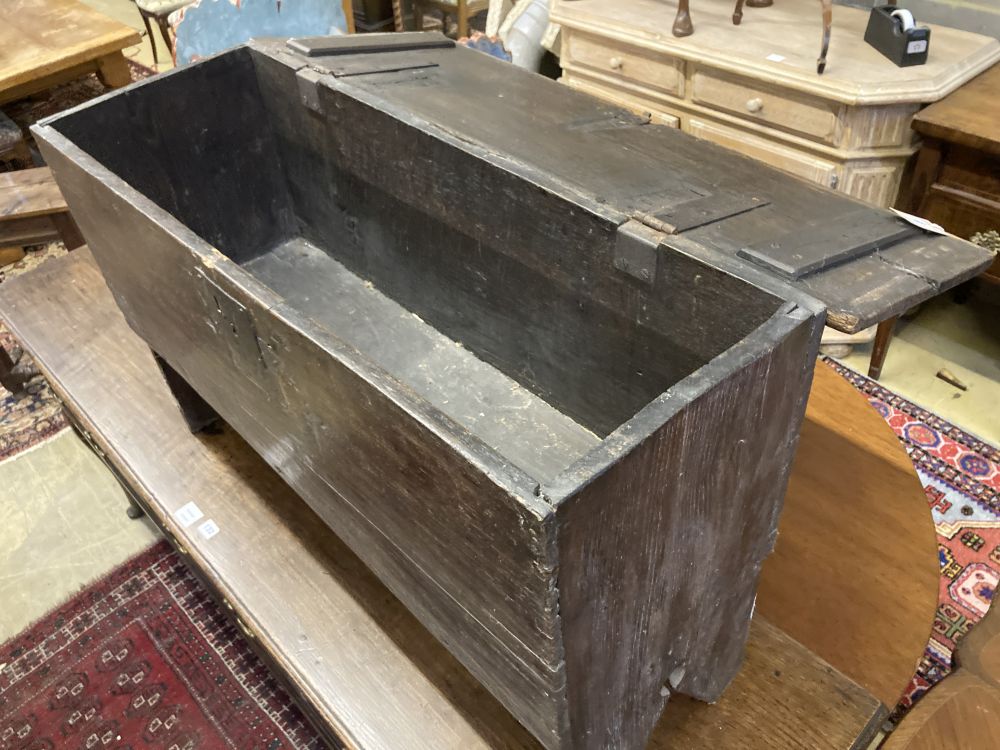 An 18th century oak panelled coffer, width 98cm depth 35cm height 60cm